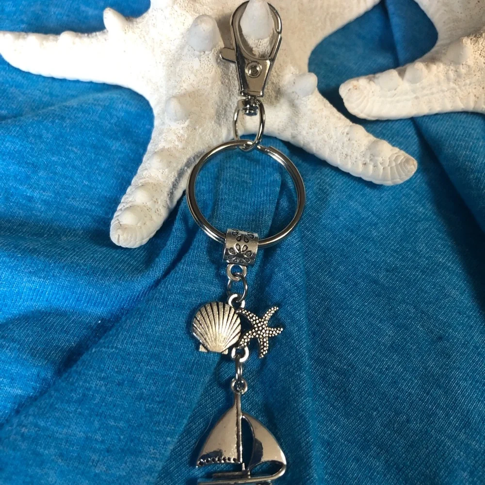 NWT, Handmade by A Charmed Life. Silver Keychain with Nautical Charms